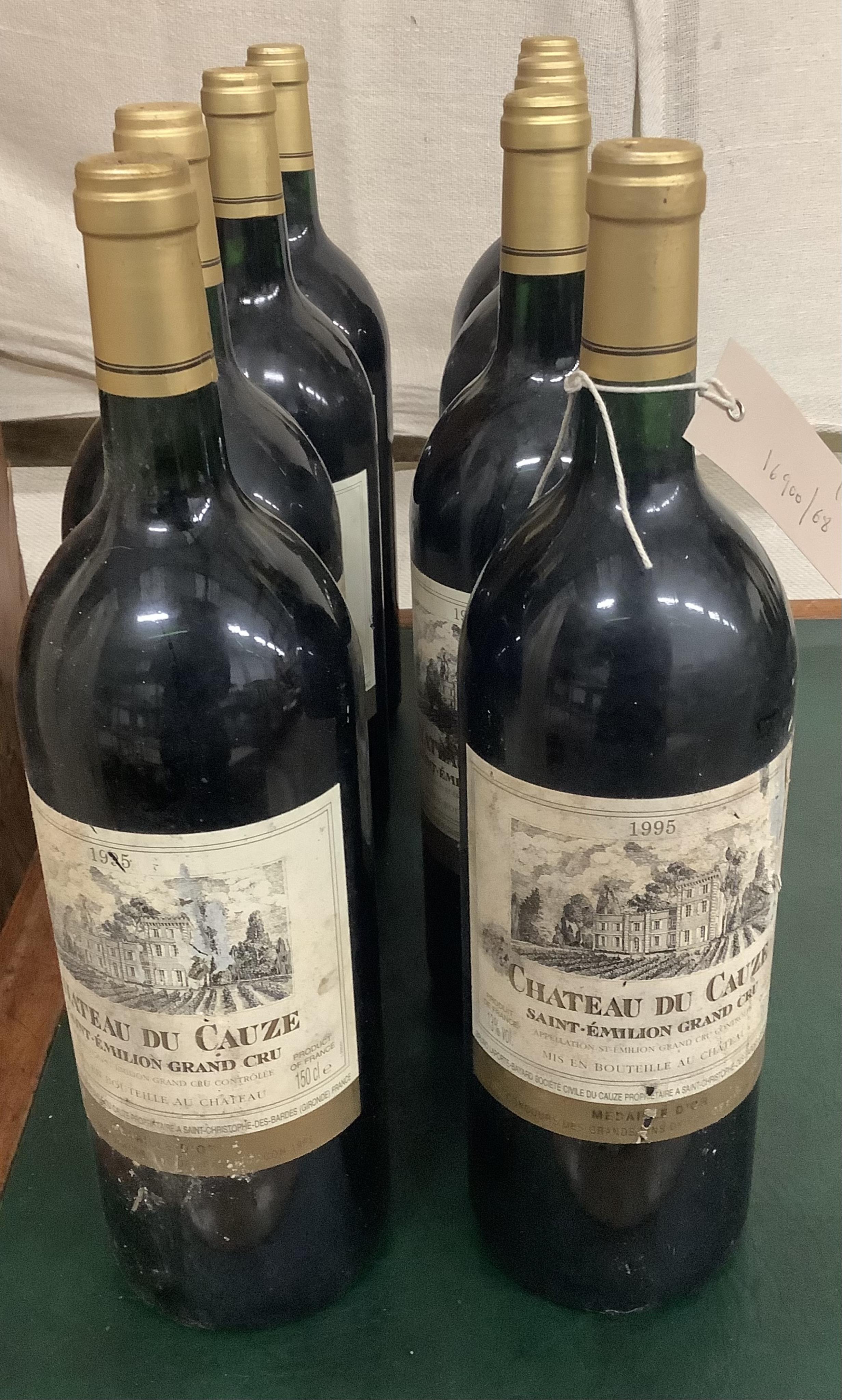 Eight magnums of Chateau Du Cauze Saint-Emillion Grand Cru 1995. Condition - fair, from a local private cellar